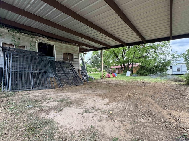 1103 Long St, Gladewater, TX 75647 - view of yard featuring a carport