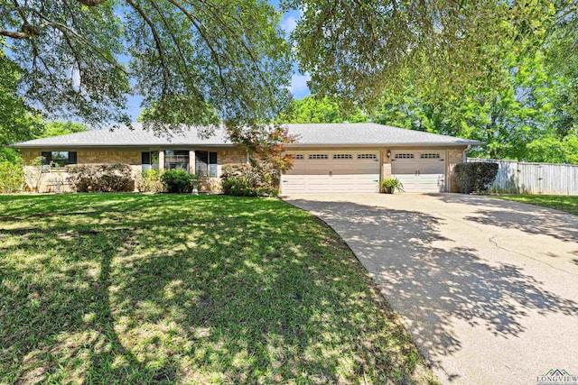 single story home featuring fence, a garage, a front lawn, and driveway