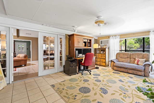 office space featuring visible vents and light tile patterned flooring