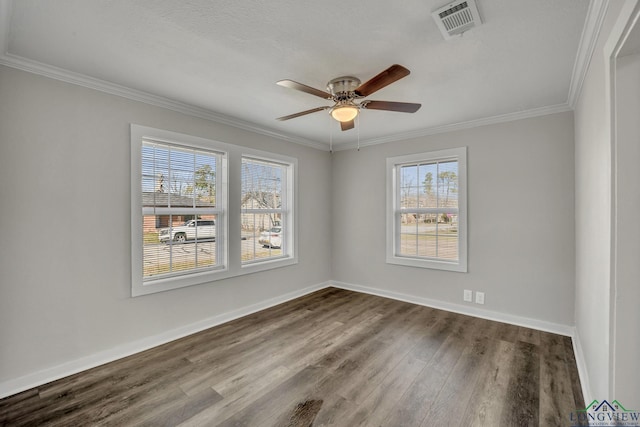 unfurnished room with wood-type flooring, a wealth of natural light, crown molding, and ceiling fan