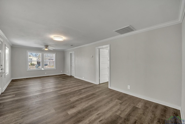 empty room with dark hardwood / wood-style flooring, ceiling fan, and ornamental molding