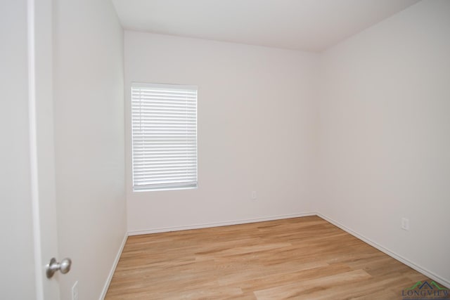 1146 Mission Creek Dr, Longview, TX 75601 - empty room featuring light wood-style floors and baseboards