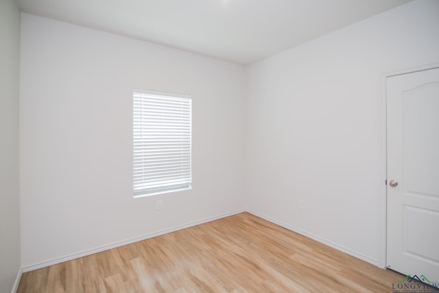 1146 Mission Creek Dr, Longview, TX 75601 - empty room featuring light wood-style flooring and baseboards