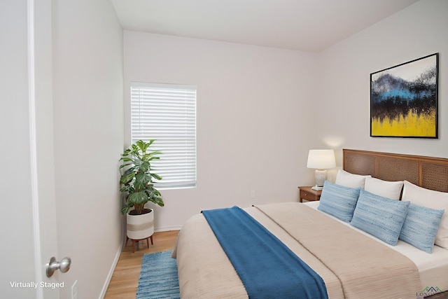 1146 Mission Creek Dr, Longview, TX 75601 - bedroom with wood finished floors and baseboards