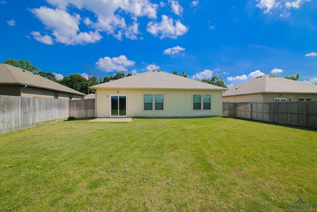1146 Mission Creek Dr, Longview, TX 75601 - rear view of property with a fenced backyard and a patio