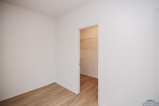 1146 Mission Creek Dr, Longview, TX 75601 - spare room featuring light wood finished floors and baseboards
