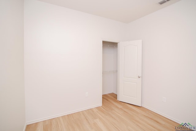 1146 Mission Creek Dr, Longview, TX 75601 - empty room featuring light wood finished floors and baseboards