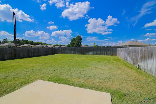 1146 Mission Creek Dr, Longview, TX 75601 - fenced backyard with a patio area