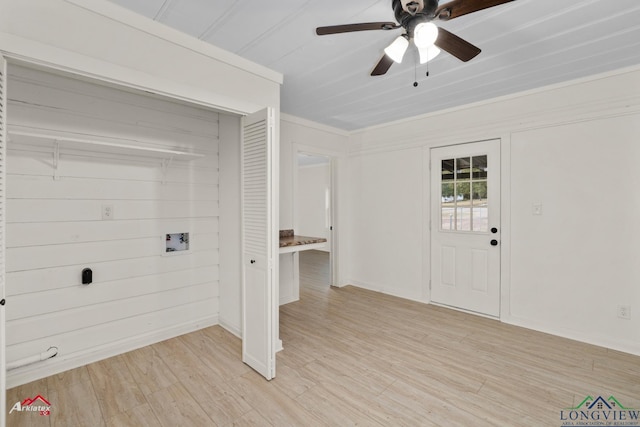 washroom with ceiling fan, light hardwood / wood-style flooring, and washer hookup