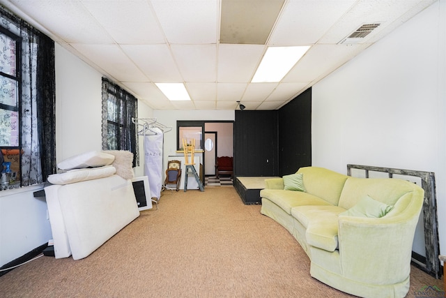 911 S Helen St, Overton, TX 75684 - living area featuring carpet and a drop ceiling