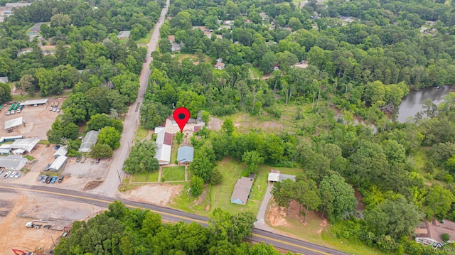 911 S Helen St, Overton, TX 75684 - aerial view of property and surrounding area featuring a nearby body of water