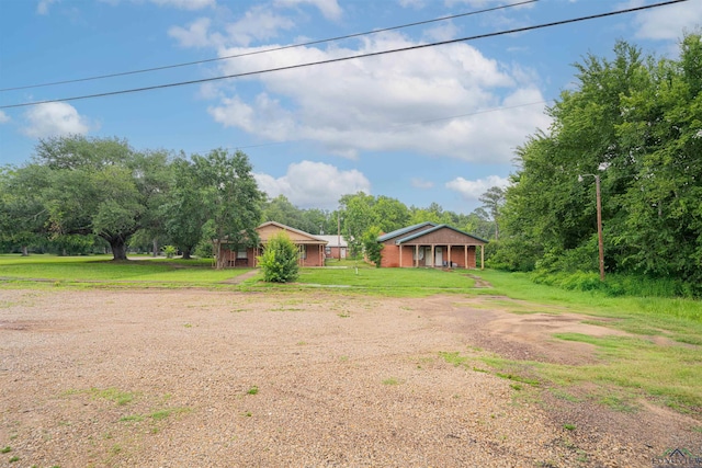 911 S Helen St, Overton, TX 75684 - view of grassy yard
