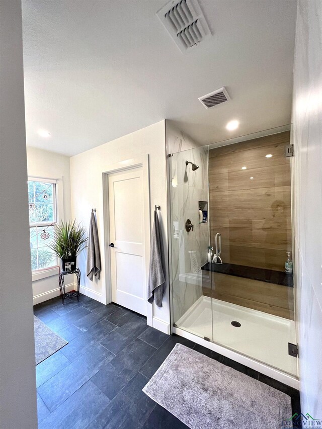 7 Rockwall Dr, Longview, TX 75604 - full bath featuring a shower stall, baseboards, and recessed lighting