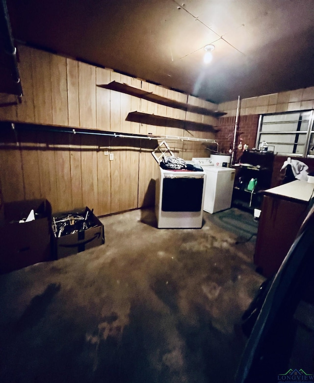 garage featuring wood walls