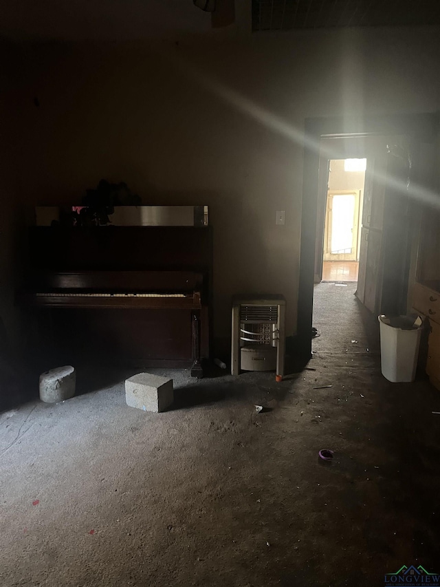 1401 Gay St, Longview, TX 75602 - unfurnished living room with heating unit