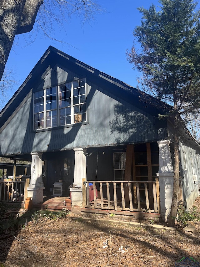 1401 Gay St, Longview, TX 75602 - rear view of house with covered porch