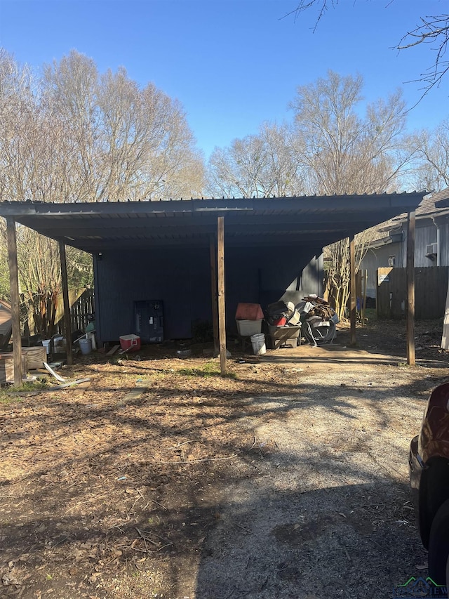 1401 Gay St, Longview, TX 75602 - view of car parking with a carport and a pole building