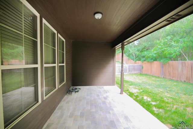 view of patio featuring a fenced backyard and visible vents