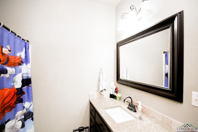full bathroom with vanity