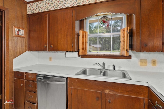 kitchen featuring stainless steel dishwasher and sink