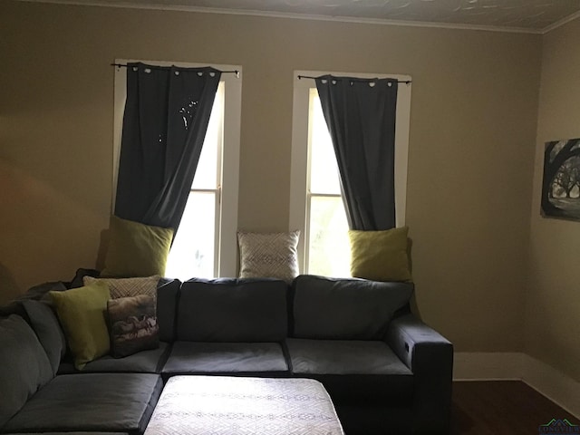 436 S Main St, Longview, TX 75601 - living room featuring baseboards and ornamental molding