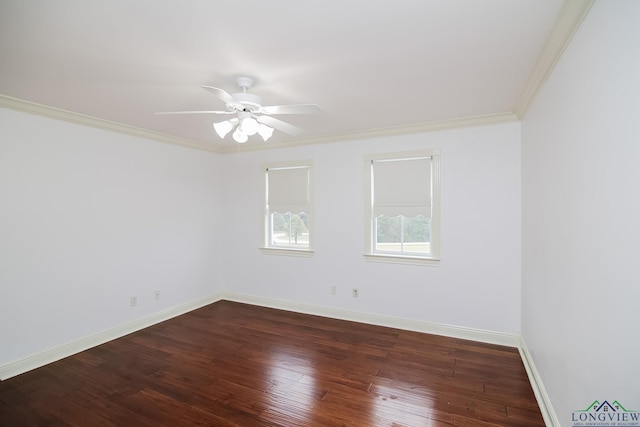 empty room with ceiling fan, dark hardwood / wood-style flooring, and ornamental molding