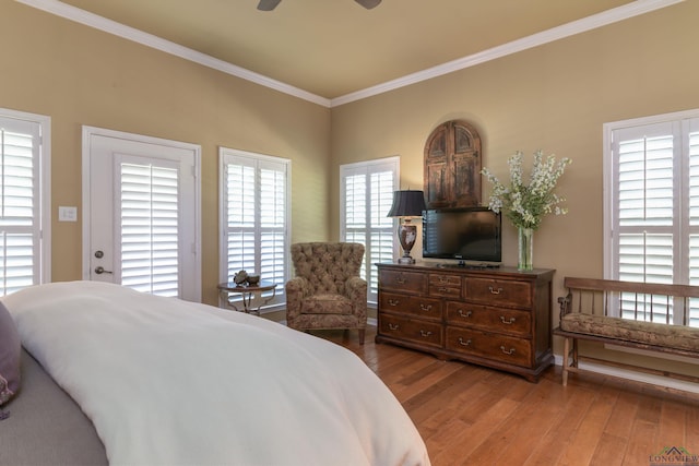 bedroom featuring access to exterior, ceiling fan, crown molding, and wood-type flooring