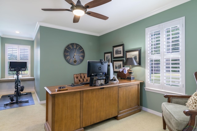 carpeted office featuring ceiling fan and ornamental molding