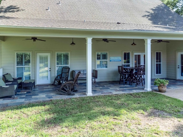 view of patio featuring ceiling fan