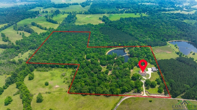 1882 County Road 3000, Joaquin, TX 75954 - aerial overview of property's location featuring a heavily wooded area and property boundaries highlighted