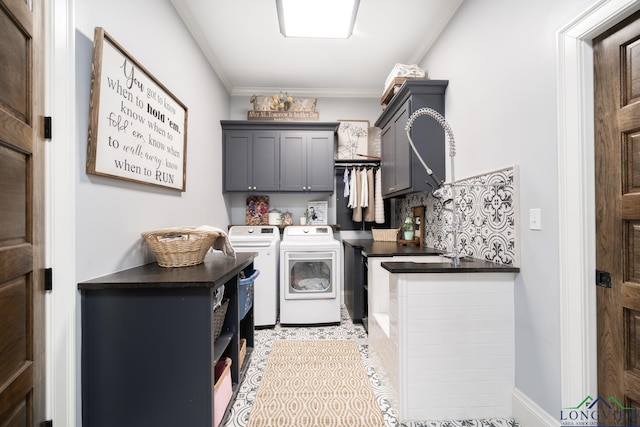 1882 County Road 3000, Joaquin, TX 75954 - washroom featuring cabinet space, washing machine and clothes dryer, and crown molding