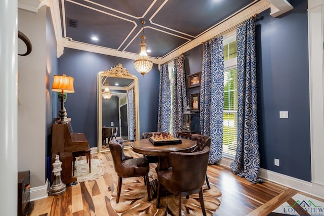 1882 County Road 3000, Joaquin, TX 75954 - dining space featuring crown molding and wood finished floors
