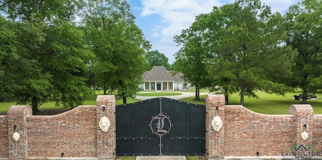 1882 County Road 3000, Joaquin, TX 75954 - gate with a lawn