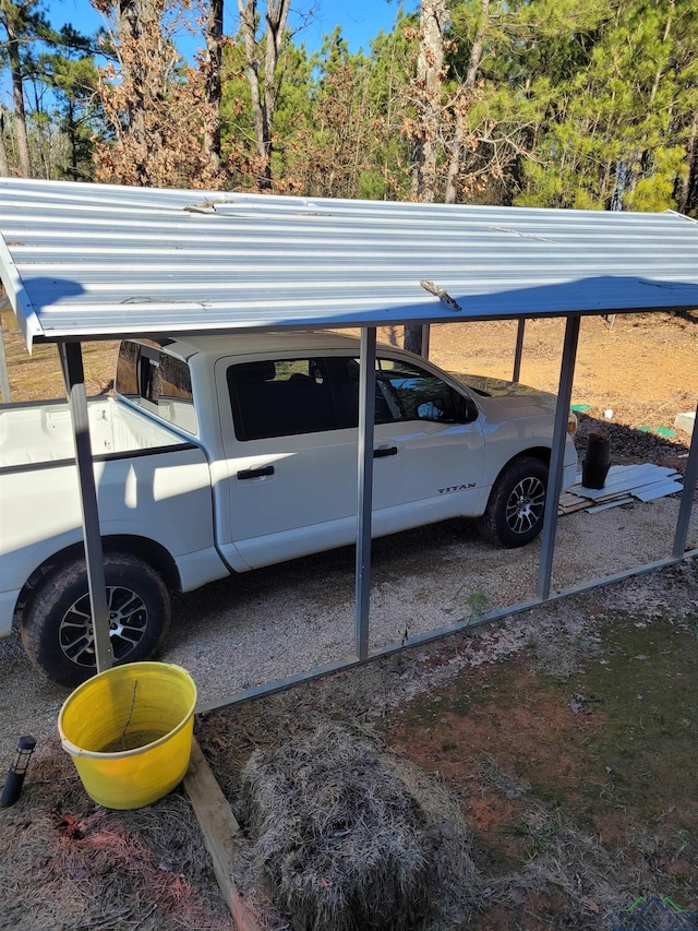 view of parking with a carport