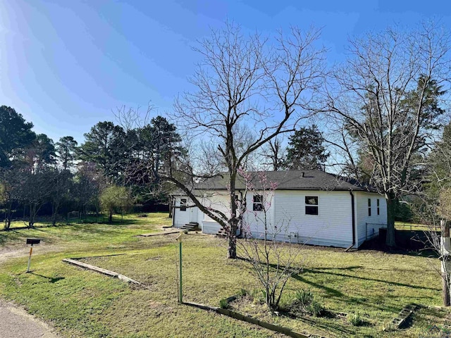 exterior space with a yard