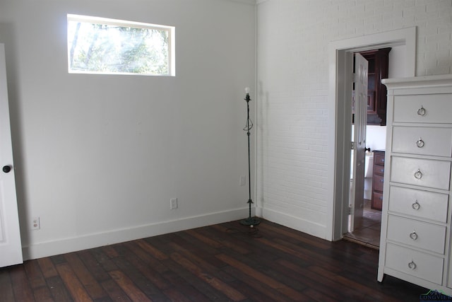 interior space with dark hardwood / wood-style flooring