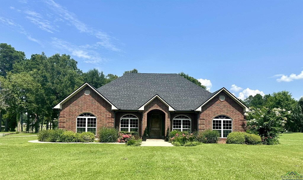 2232 N US Highway 59, Carthage, TX 75633 - view of front of property featuring a front lawn