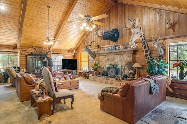 living room featuring beamed ceiling and wood walls