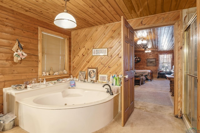 bathroom featuring a washtub, ceiling fan, wooden walls, and wood ceiling