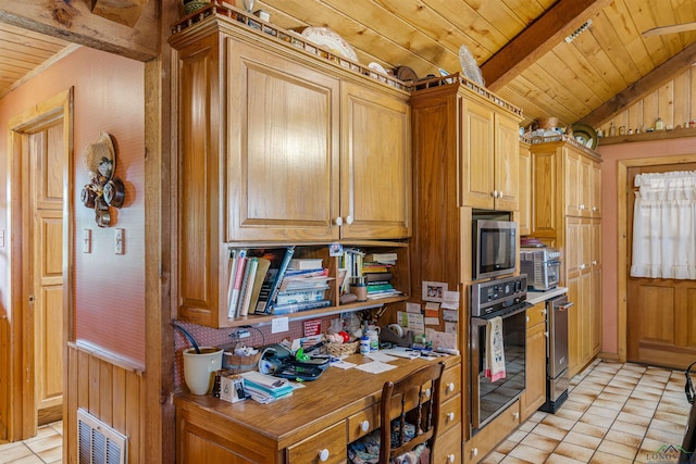 kitchen featuring stainless steel microwave, wooden ceiling, lofted ceiling with beams, black oven, and light tile patterned flooring