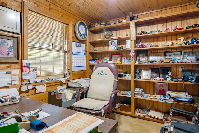 home office with wood walls, light colored carpet, and wood ceiling