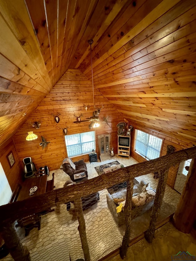 unfurnished bedroom with wood walls, wood ceiling, and lofted ceiling