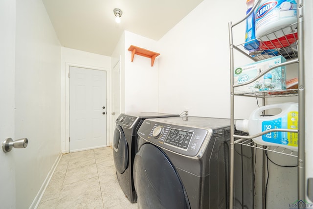 washroom with washer and dryer