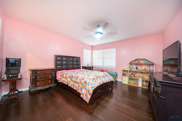 bedroom featuring ceiling fan and dark hardwood / wood-style floors