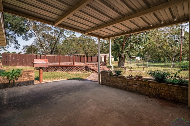 view of patio featuring a deck