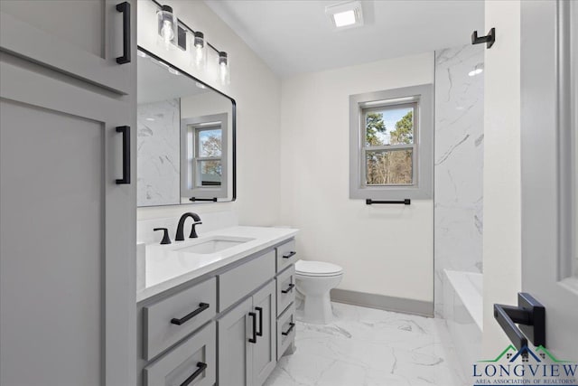 full bathroom featuring toilet, vanity, marble finish floor, a shower, and a tub