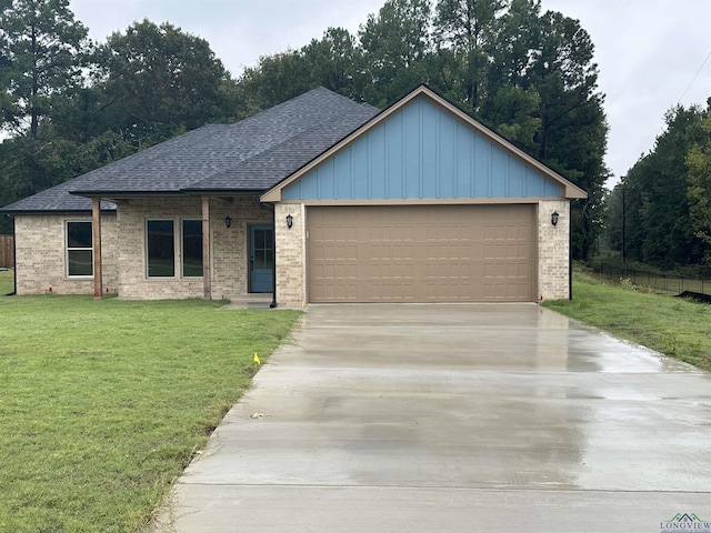 153 Heartland Xing, Diana, TX 75640 - ranch-style house featuring a shingled roof, concrete driveway, brick siding, an attached garage, and board and batten siding