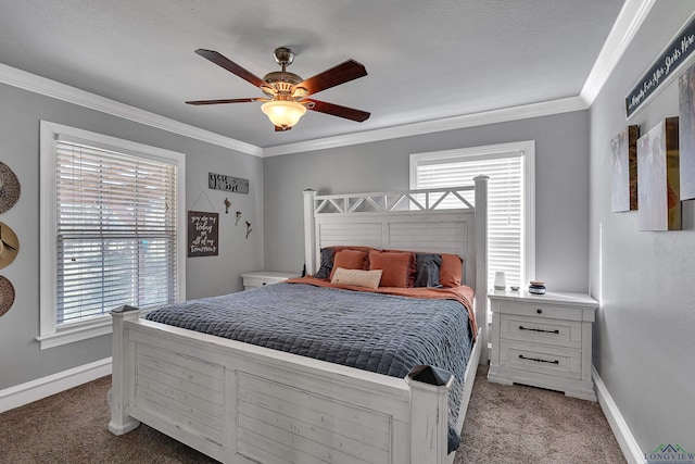 carpeted bedroom featuring baseboards, ornamental molding, and a ceiling fan