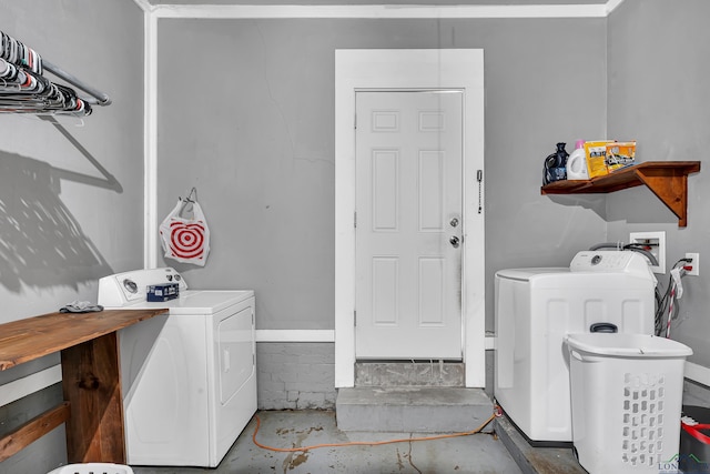 washroom with laundry area and separate washer and dryer