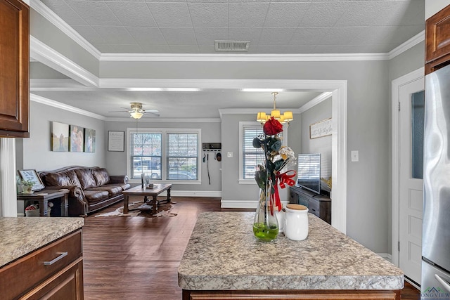 kitchen featuring open floor plan, light countertops, dark wood-style floors, and visible vents